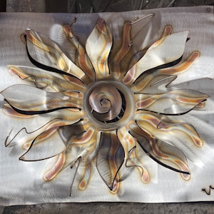 Stainless Steel Sun - 15x15 Stainless steel metal wall-hanging.  Perfect for indoor, outdoor, home and business decor and design.