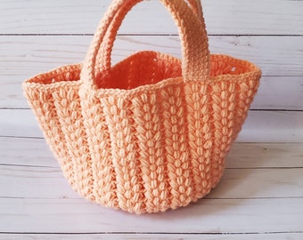Elegant handmade wrist crocheting bag.