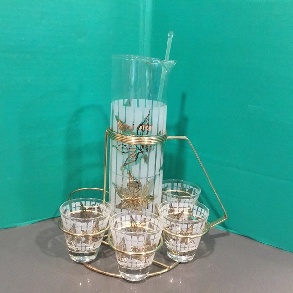 Mid century bar caddy glass and brass drink pitcher w shot glasses n stir stick, gold leaves on clear & frosted etched glass by Libbey (?)