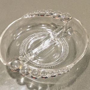 Vintage Duncan Miller divided glass dish-Teardrop pattern-wave shape-clear w glass toe/balls-handles-split relish-trinket-candy-catchall