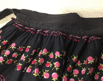 Vintage 1950s apron w black n pink apples, stripe bars in red pink white, very full gathered skirt, pretty happy waist tie cotton half apron