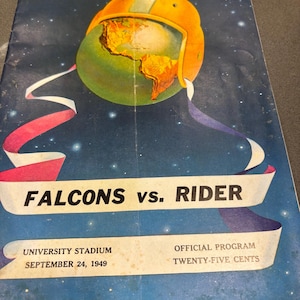 May include: Vintage football program cover featuring a football helmet over a globe, set against a starry blue background. The text reads "FALCONS vs. RIDER" and "UNIVERSITY STADIUM SEPTEMBER 24, 1949". The program is an official program.