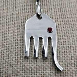 Silver Plated Fork Elephant Pendant Necklace With A Rhinestone Crystal Eye.