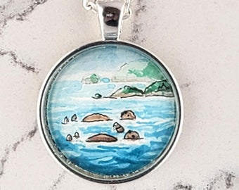 Sea otters holding hands and floating necklace, watercolor hand-painted miniature illustration. Cute otter pendant