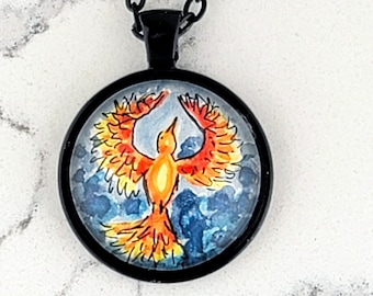 Phoenix rising from ashes watercolor hand-painted miniature illustration necklace. One-of-a-kind unique key ring or pendant