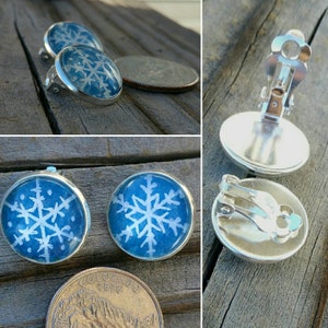 Snowflake clip-on earrings. Hand-painted snowflakes, each is unique! Silver-plated clip on earrings, winter jewelry clipons