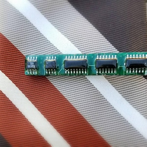 Motherboard tie bar. Circuit board tie bar clip, made from actual upcycled obsolete motherboard in gloss resin on silver plated clip bar