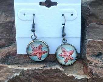 Starfish earrings. Hand-Painted star sea star earrings.  Watercolor wearable art earrings, sea star or starfish in silver-plated bezels.