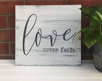 Love Never Fails. 1 Corinthians 13:8 / Scripture Sign / Weathered Wood / Bible Verse Wall Art •