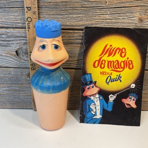 Vintage Nestlé Quik bottle and book collectable 60’