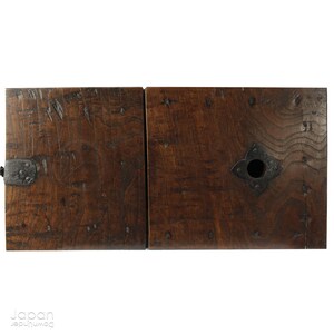 A wonderful old antique Japanese box used for safely storing money. In the Edo period the Japanese government distributed a small, copper coin, known as the zeni which was used for around 260 years.