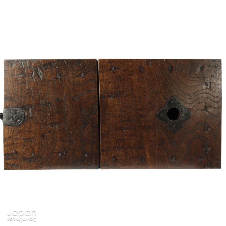 A wonderful old antique Japanese box used for safely storing money. In the Edo period the Japanese government distributed a small, copper coin, known as the zeni which was used for around 260 years.