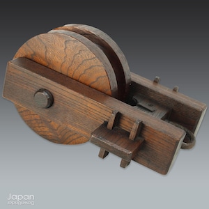handcrafted japanese wood pulley - antique art object with great patina