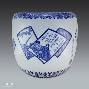 vintage japanese blue and white imari hibachi heating pot with karuta game card motifs, japanese planter