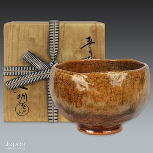 handcrafted vintage japanese tea bowl - ohi ware pottery in stunning caramel gloss