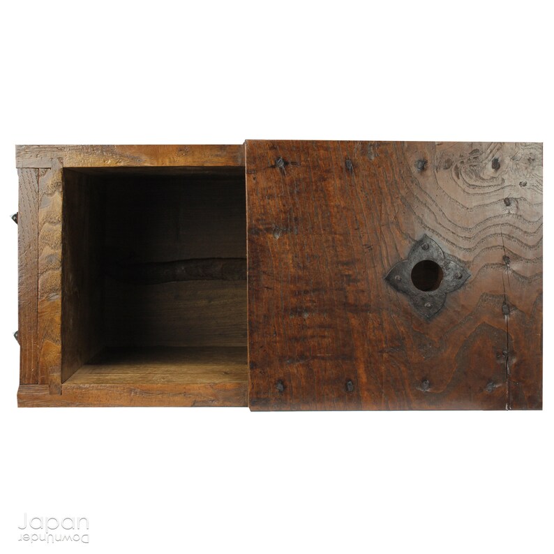 A wonderful old antique Japanese box used for safely storing money. In the Edo period the Japanese government distributed a small, copper coin, known as the zeni which was used for around 260 years.