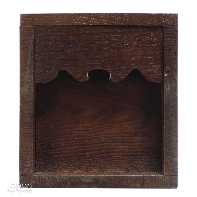 A wonderful old antique Japanese box used for safely storing money. In the Edo period the Japanese government distributed a small, copper coin, known as the zeni which was used for around 260 years.