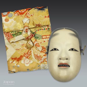 japanese antique noh mask of young woman ko-omote