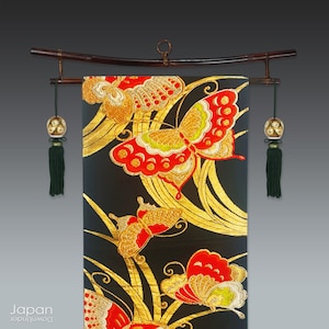 vintage japanese obi with gold and red embroidered butterflies on black background, obi wall hanging