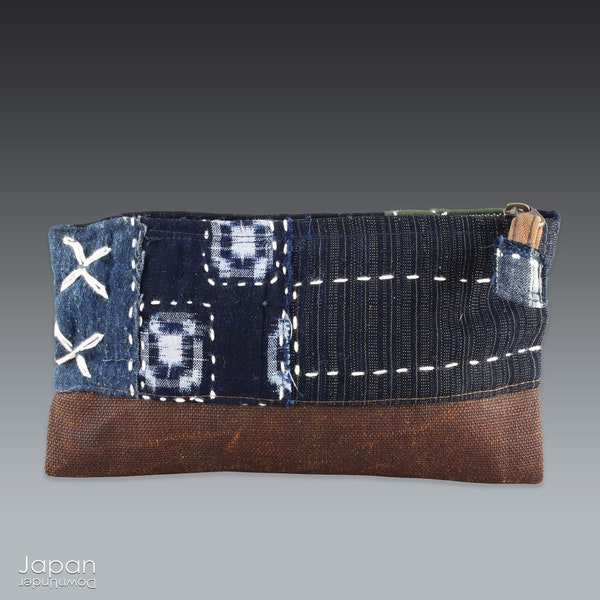 japanese antique indigo and ikat fabric patchwork pouch with zipper, hand made aizome kasuri and sakebukuro boro pouch