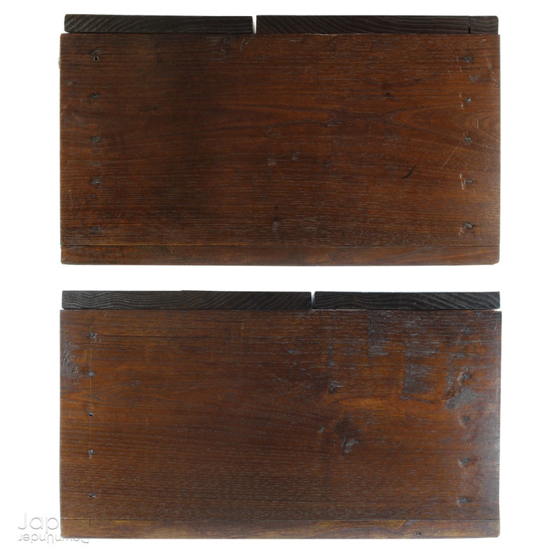 A wonderful old antique Japanese box used for safely storing money. In the Edo period the Japanese government distributed a small, copper coin, known as the zeni which was used for around 260 years.
