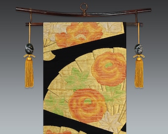 vintage japanese obi with gold fans, camellia, peony and butterflies on black background, obi wall hanging