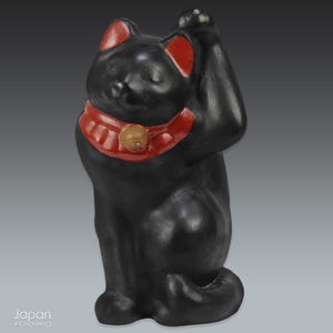 vintage japanese black maneki neko - folk art lucky cat with winking eye