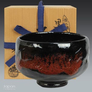 vintage japanese black raku tea bowl with red accents - tea ceremony matcha chawan