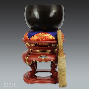 handcrafted large buddhist temple singing bowl on brocade cushion and red lacquer stand