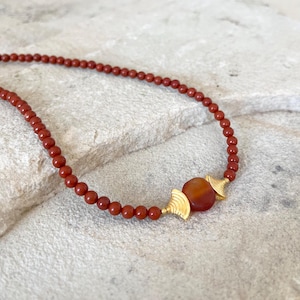 Necklace with an antique carnelian bead, jasper and 18 carat gold