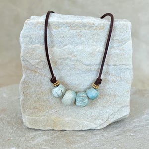 Necklace with antique Egyptian faience beads and 750 18k gold, leather chain