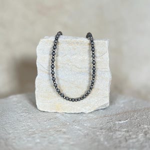 Necklace with corrugated Navajo Saucer beads, Sterling Silver