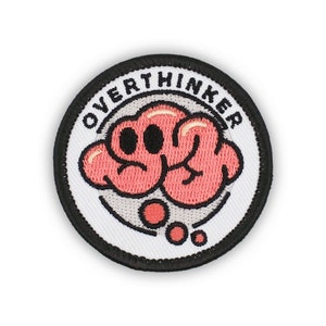 May include: A white embroidered patch with a black border. The patch features a pink brain with a worried expression and the text "Overthinker" in black.