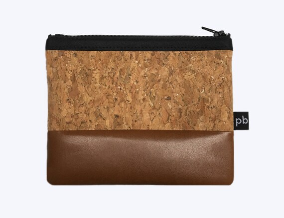 small tan clutch bag