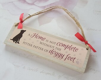 A home is not complete without the pitter patter of doggy feet - wooden plaque