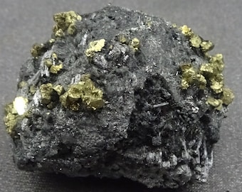 Golden Chalcopyrite crystals atop black Bournonite crystals, China  Mineral Specimen for Sale