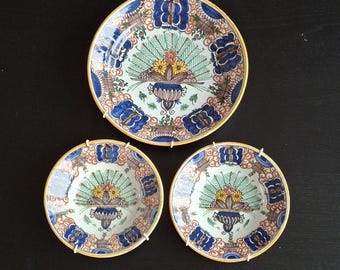 Antique peacock wall plates, 19th century Delftware