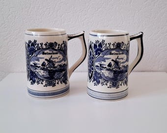Pair of vintage Heineken Delft Blue beer mugs, Dutch beer steins