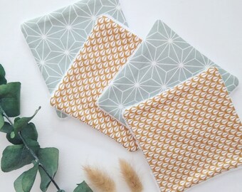 Lingettes lavables par 4  en tissu coton oeko-tex et éponge de bambou tons ocre/vert sauge à motifs graphiques