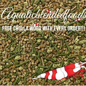 May include: Image of aquatic blended foods for shrimp. The food is a mix of brown and green pellets and sticks. The image includes a red and white shrimp and the text "Aquaticblendedfoods" and "FREE CHOLLA WOOD WITH EVERY ORDER!!!".