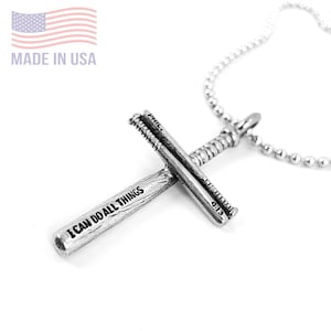 May include: Silver baseball bat cross necklace with the words "I can do all things" and "Phil 4:13" engraved on the bats.
