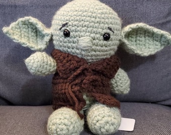 Green Alien wearing robe