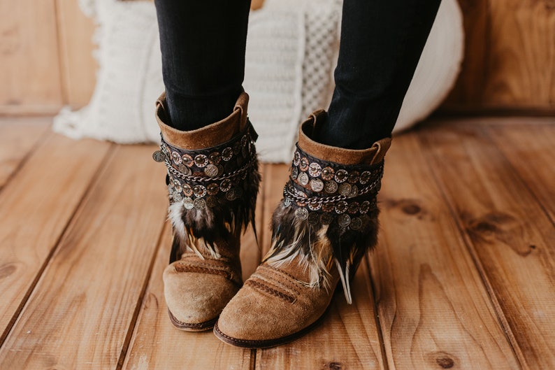 Tribal boot covers featuring embroidered feathers and coin wrap, perfect for enhancing your leather ankle boots with boho style and unique flair