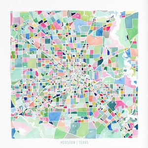 May include: A framed watercolor map print of Houston, Texas, featuring a colorful abstract design. The artwork displays a detailed city layout with various geometric shapes in shades of pink, blue, green, and yellow. The text "HOUSTON TEXAS" is at the bottom.