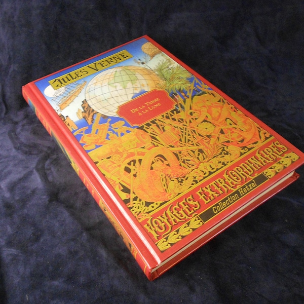 Réplique Jules Verne De La Terre A La Lune Edition Hetzel Version française avec gravures Couverture dorée Bon état Belle réplique