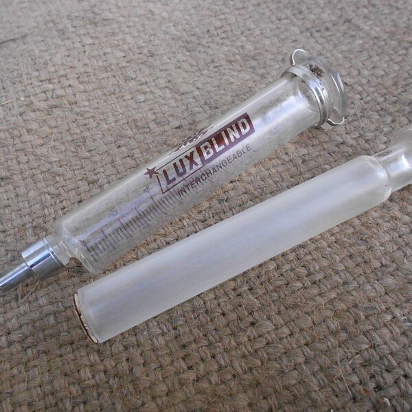 Vintage French Medical 20cl Syringe This is a glass syringe With a Metal fitting for needles