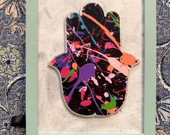 Splatter painted 80s vibe Hamsa
