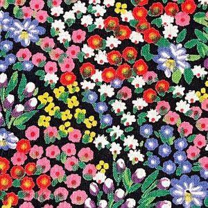 May include: A close-up of a floral pattern on a black background. The pattern features a dense arrangement of small flowers in various colours, including pink, red, yellow, white, and blue. Green leaves and stems are interspersed throughout the design.