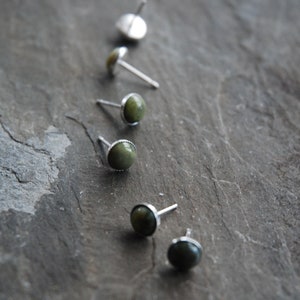 Sterling Silver small earring stud set with 6 mm Connemara Marble Cabochon stone. Stg silver scroll backs - gift boxed