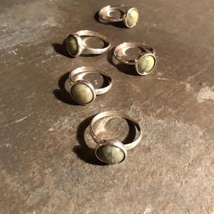 Lovely Sterling silver ring with 8mm centre from Connemara marble. Available in different sizes  - Gift boxed. Made and posted from Ireland